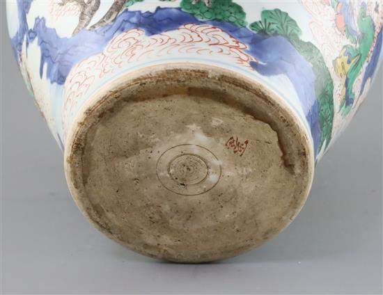 A Chinese wucai baluster vase, Transitional period c.1640, H.28cm, restorations